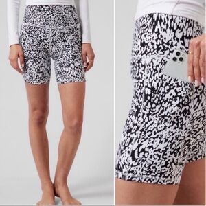 $68 MSRP Athleta Salutation Stash Pocket II shorts in leopard size medium